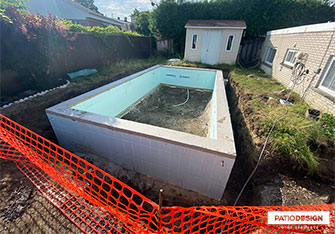 Inground pool Installation by Patio Design inc.