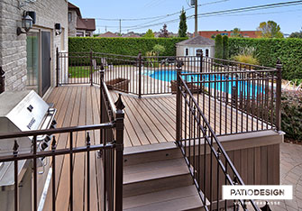 Patio avec piscine creusée par Patio Design inc.