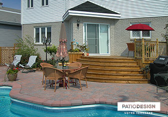 Patio with inground pool by Patio Design inc.