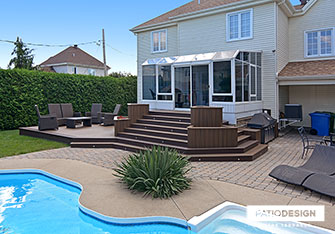 Patio with inground pool by Patio Design inc.