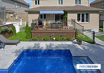 Patio avec piscine creusée par Patio Design inc.