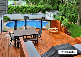 Patio avec piscine creusée par Patio Design inc.