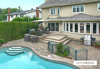 Patio with inground pool by Patio Design inc.