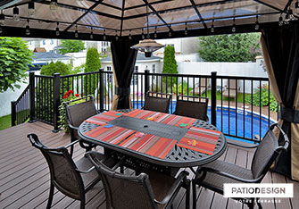 Patio with inground pool by Patio Design inc.